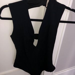 Low cut, cut out black bodysuit